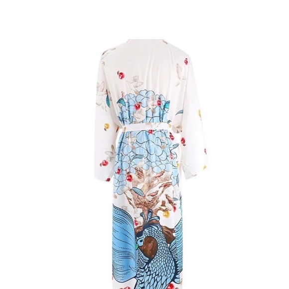 Blue Bird Fruit Blossoms
Kimono Duster
$74 $74 Size: Various - Picture 5 of 6